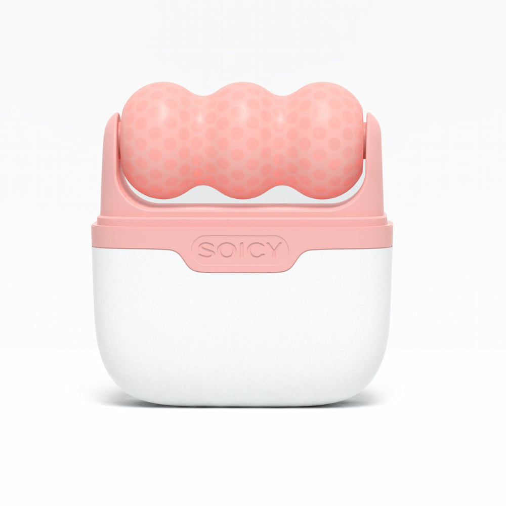 Ice Roller Soicy S30 in roze geplaatst in zijn witte opbergkoffer – verkoelende gezichtroller voor zwelling, lymfedrainage en versteviging van de huid.